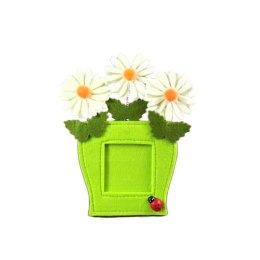 Zielona ramka na zdjęcie z trzema margaretkami na sprężynkach