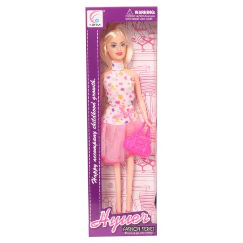 Lalka w kolorowej bluzce, różowej tiulowej spódniczce i z różową torebką